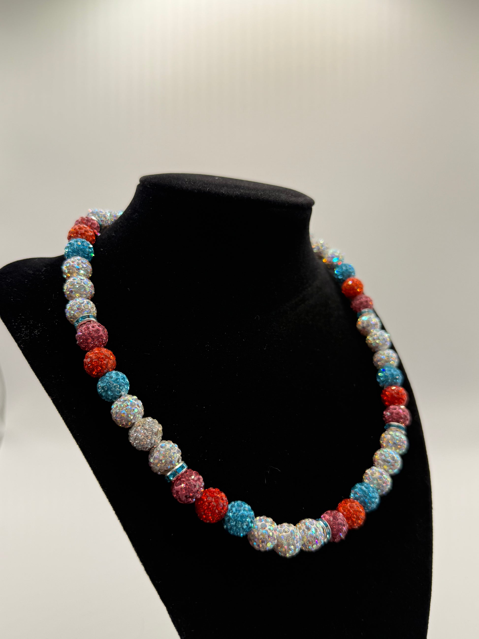 White, Pink, Teal, Orange Chain